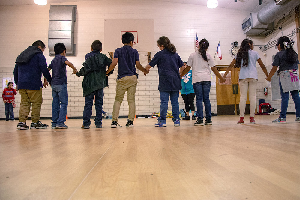 Students participating in a Stronger Austin Kids activity